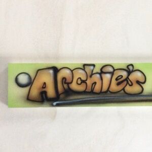Homemade Billiards Sign reads: “Archie’s Bunker”